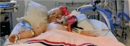  ??  ?? Battling for survival: Scarlett Nicholas, five, on a ventilator in intensive care in a photo her family posted online