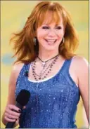  ?? CHARLES SYKES, THE ASSOCIATED PRESS ?? Reba McEntire joins Brooks & Dunn to replace Celine Dion at The Colosseum.