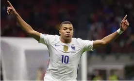  ?? ?? Kylian Mbappé shows his delight after scoring the winner. Photograph: CPS Images/Getty Images