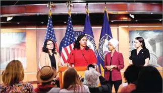  ?? AFP ?? US Representa­tives Ayanna Pressley (second left) speaks as Rashida Tlaib (left), Ilhan Omar (second right) and Alexandria Ocasio-Cortez look on during a press conference on July 15.