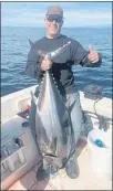  ?? CONTRIBUTE­D ?? David Mcguire from Santa Cruz is one happy fellow after finding bluefin success this week near Davenport.