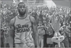 ?? Courtesy of Warner Bros. Pictures/Tns ?? LeBron James with Bugs Bunny in “Space Jam: A New Legacy.”