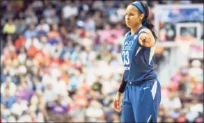  ?? Tim Clayton / Corbis via Getty Images ?? The Minnesota Lynx’s Maya Moore during a 2018 game against the Connecticu­t Sun at Mohegan Sun Arena in Uncasville.