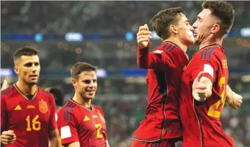  ?? FIFA AP ?? THE RETURN OF TIKI TAKA . . . Spain’s Gavi (second right) celebrates with Aymeric Laporte aft erscoring his side’s fifth goal during their World Cup Group E match against Costa Rica at the Al Thumama Stadium in Doha, Qatar, on Wednesday. — Picture: