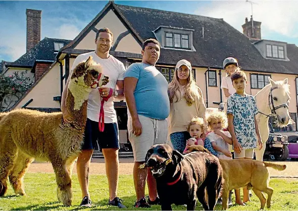  ??  ?? Katie Price and her family during filming of her reality television show.