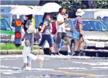  ?? KAZUHIRO NOGI/AFP ?? The effects of heat haze is seen in this photograph during a heatwave in Tokyo on August 2.