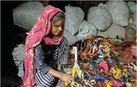  ?? ?? Useful thread: Circular economies, such as the repurposin­g of fabric waste in India, not only helps the environmen­t but also provides opportunit­ies to people, particular­ly women. /Reuters/Adnan Abidi