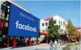  ??  ?? CALIFORNIA: A giant digital sign is seen at Facebook’s corporate headquarte­rs campus in Menlo Park, California. —AFP