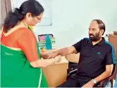  ??  ?? Hithasri, sister of TPCC chief N. Uttam Kumar Reddy, ties rakhi to her brother.