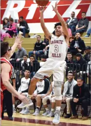  ?? RECORDER PHOTO BY CHIEKO HARA ?? Granite Hills High School’s Armando Cabrera takes a shot Thursday, Jan. 31, 2019 during the second half of the game against Lindsay High School at Granite Hills High School.