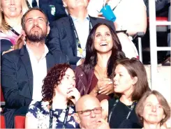  ??  ?? Meghan Markle, top right, attends the Invictus Games opening ceremonies in Toronto. (AP)