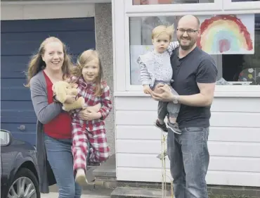  ??  ?? 0 Residents of Banknock, near Falkirk, gather on their doorsteps at 7pm to sing Reach for the Stars