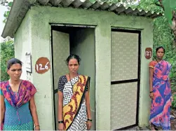  ??  ?? Beneficiar­ies Manda Raghunath Wagh (126) and Pinky Kaluram Fasale (127) at their respective household toilets