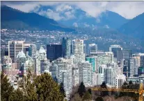  ?? DARRYL DYCK/THE CANADIAN PRESS FILES ?? The government’s mortgage stress tests and policy measures have been attributed to the downward trend in prices and sales activity in Vancouver, once a hot housing market.