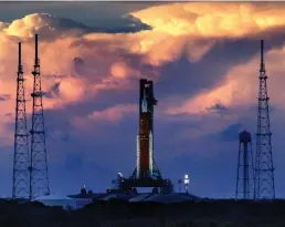  ?? Tribune News Service ?? The sun sets over Artemis I, NASA’S heavy-lift lunar rocket system, on Sept. 3, 2022, at Kennedy Space Center, Florida.