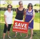  ?? Sophie Vaughan / Hearst Connecticu­t Media ?? Mary Anne Liesner, Tina Torraco, and Joan Miller, all members of Westport Neighbors United LLC, stand in the front yard of Torraco’s home on Westport’s Riverside Avenue.