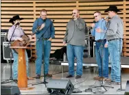  ?? Janelle Jessen/Herald-Leader ?? The Butler Creek Boys were the first band to ever perform on the new stage in the Chautauqua Amphitheat­er on Saturday.