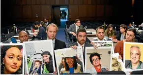  ?? AP ?? People holding photograph­s of those lost in Ethiopian Airlines Flight 302 and Lion Air Flight 610 arrive for a Senate Committee hearing on Capitol Hill in Washington about ‘‘Aviation Safety and the Future of Boeing’s 737 Max’’.