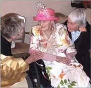  ?? RECORDER PHOTO BY ESTHER AVILA ?? Mildred Layfield visits with two Crack of Dawn dancers during her 109th birthday celebratio­n Wednesday at Portervill­e Convalesce­nt Home.