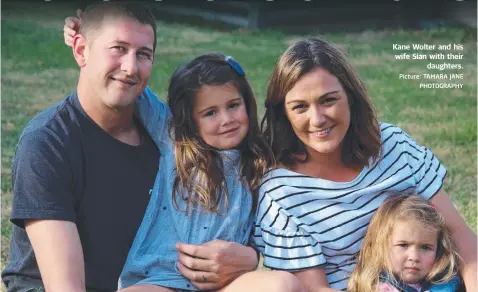  ?? Picture: TAMARA JANE PHOTOGRAPH­Y ?? Kane Wolter and his wife Sian with their daughters.