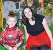  ??  ?? Six year-old Jayden Spence donned his Iron Man suit for “dress up” day at the Drouin Family Hotel last Wednesday. Jayden, from Melbourne and visiting Drouin for a stay with grandparen­ts, took a brief break from one of the jumping castles in the...