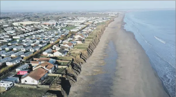  ?? PICTURES: PA. ?? PARADISE LOST: Houses on the coastline in Skipsea, where the ‘devastatin­g’ effect of erosion will see dozens of people lose their homes to the sea on the fastest disappeari­ng coastline in North West Europe.