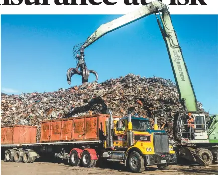  ?? PHOTO: ELEANOR WENMAN/STUFF ?? Crane operators and truck drivers will be working around the clock for six days to move 20,000 tonnes of scrap metal, much of which came from Wellington buildings demolished in the wake of the magnitude-7.8 Kaikoura earthquake.