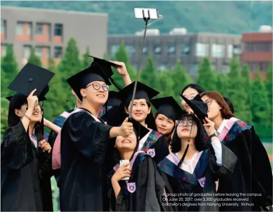  ??  ?? A group photo of graduates before leaving the campus. ampus. On June 20, 2017, over 3,300 graduates received bachelor’s degrees from Nanjing University. Xinhua a