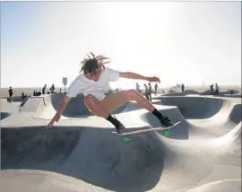  ?? Jon Penson ?? JESUS CORREA shows off his moves at the Venice Skatepark in “Made in Venice,” a documentar­y on the site and its local skateboard community.