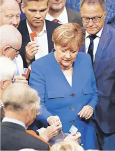  ?? FOTO: REUTERS ?? ►► Merkel durante la votación del matrimonio gay, el viernes, en Berlín.