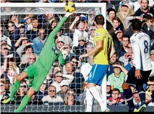  ?? Reuters ?? Tim Krul makes a save from Paulinho during the match at White Hart Lane in London on Sunday. —