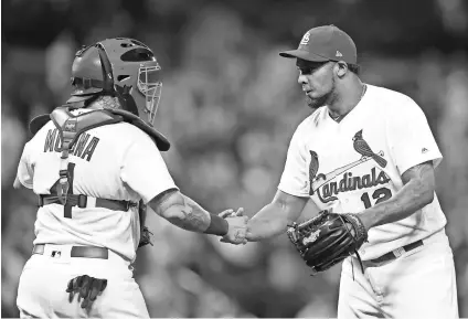  ??  ?? St. Louis Cardinals relief pitcher Juan Nicasio has provided a late-season lift for the bullpen. He earned saves in his first two appearance­s after a trade with Philadelph­ia.