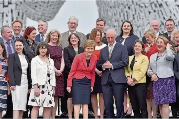  ??  ?? New role Clare Haughey, pictured to the left of Nicola Sturgeon, was one of 51 new MSPs elected last month