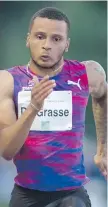  ?? DARRYL DYCK/ THE CANADIAN PRESS ?? Canadian sprinter Andre De Grasse, of Markham, Ont., will miss the upcoming world track and field championsh­ips in London due to a hamstring injury.