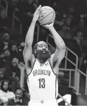  ?? Todd Kirkland / Getty Images ?? James Harden was one of seven players from the Nets who entered COVID-19 protocols before Tuesday’s home game against the Raptors.