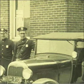  ?? PHOTO COURTESY OF THE WESTLAKE PORTER PUBLIC LIBRARY ?? The Dover Police Department circa 1929. Dover changed to Westlake in 1940.