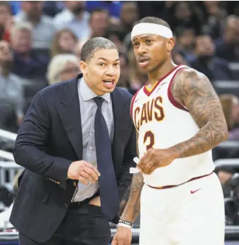  ?? Willie J. Allen Jr. / Associated Press ?? Cleveland head coach Tyronn Lue talks to guard Isaiah Thomas, who has yet to excel with the Cavaliers. Thomas has missed 21 of his past 26 shots coming into Monday’s game.