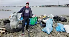  ??  ?? Meet Luke Macdonald, referred to by his ocean warrior friends as a “superstar cleaner.” This photo was taken at the Scotian Shores Lawlor Island Clean Up, where the team removed more than 4,000 lbs (1,800 kgs) of shoreline debris! Thank you for doing what you do for our planet.