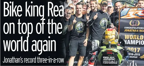  ??  ?? WHEEL DEAL Jonathan Rea, centre in cap, in France yesterday