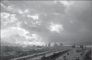  ?? The Associated Press ?? MOVING IN: Sheets of rain and heavy clouds move into the city ahead of the landfall of Tropical Storm Gordon in New Orleans, La., on Tuesday.