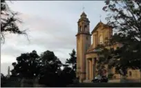  ?? AP FILE PHOTO ?? This Sept. 27, 2015, file photo shows St. Martin’s Chapel at dawn at St. Charles Borromeo Seminary in Wynnewood. St. Charles Borromeo Seminary was founded in 1832 and based at its current location for nearly 150 years. Lawyers representi­ng St. Charles Borromeo Seminary in Wynnewood have filed an appeal of Lower Merion Township’s vote last month to designate the site as a Class 1 historic property.