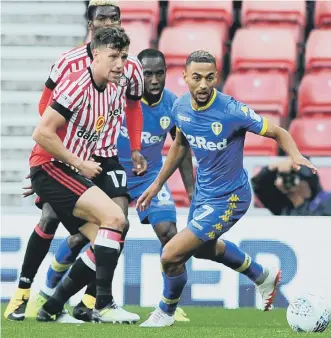  ??  ?? Billy Jones battles against Leeds United sub Kemar Roofe on Saturday. Picture by Frank Reid.