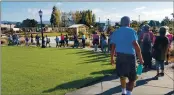  ?? STAFF ARCHIVES ?? A group of walkers follows a tour guide at Alameda’s Jean Sweeney Open Space Park on a Saturday morning. Once complete, it will be the city’s biggest park.