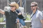  ?? Stephanie Blomkamp Columbia Pictures ?? NEILL BLOMKAMP , left, directs Hugh Jackman in the new film “Chappie.”