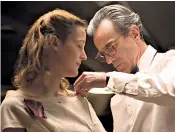  ??  ?? After a fashion: Phantom Thread’s Reynolds Woodcock (Daniel Day-lewis, left, with Vicky Krieps), is inspired by the life of Charles James (above, with Austine, wife of William Randolph Hearst Jr, in 1947)