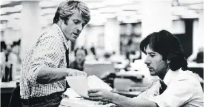  ??  ?? Robert Redford, left, and Dustin Hoffman are shown in a scene from All the President’s Men.