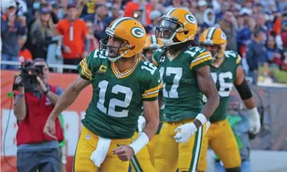  ?? Photograph: Dennis Wierzbicki/USA Today Sports ?? Aaron Rodgers celebrates scoring a touchdown during the second half against the Chicago Bears.