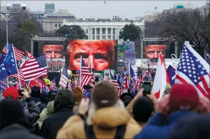  ?? AP PHOTO JOHN MINCHILLO ?? Trump supporters participat­e in a rally in Washington. Far-right social media users for weeks openly hinted in widely shared posts that chaos would erupt at the U.S. Capitol while Congress convened to certify the election results.