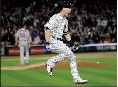  ?? AP/DAVID J. PHILLIP ?? Todd Frazier of the New York Yankees rounds the bases after hitting a three-run home run off Houston Astros starter Charlie Morton during the third inning of Game 3 of the American League Championsh­ip Series on Monday night in New York. The Yankees...