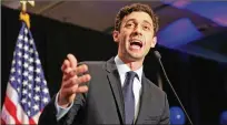  ?? JASON GETZ / AJC ?? Democrat Jon Ossoff delivers his concession speech Tuesday at the Westin Atlanta Perimeter Hotel . Ossoff, whose congressio­nal challenge fell short, said the fight is not over.